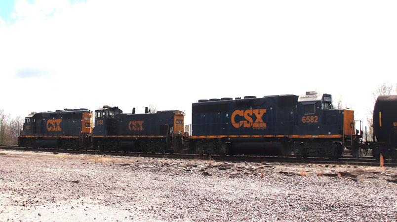 CSXT 6033, CSXT 1132, and CSXT 6582 with UTLX 601645 in the LaGrange Yard.