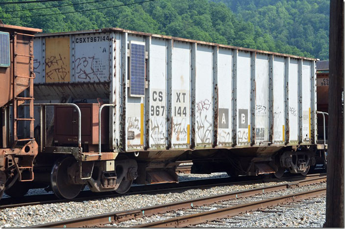 CSX MW ballast hopper 967144 is ex-Conrail 53145, former class BH1D. Shifter C861-21 is taking 10 loads of ballast from Shelby to Martin on 06-13-2021. Shelby KY.