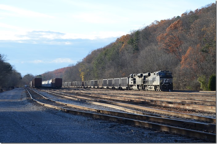 Yuma Yard is in Virginia about three miles west of Frisco. It was used more for coal storage than general freight. 72K-21 pulls to a stop on the passing siding. NS 8079-1039. Yuma VA.