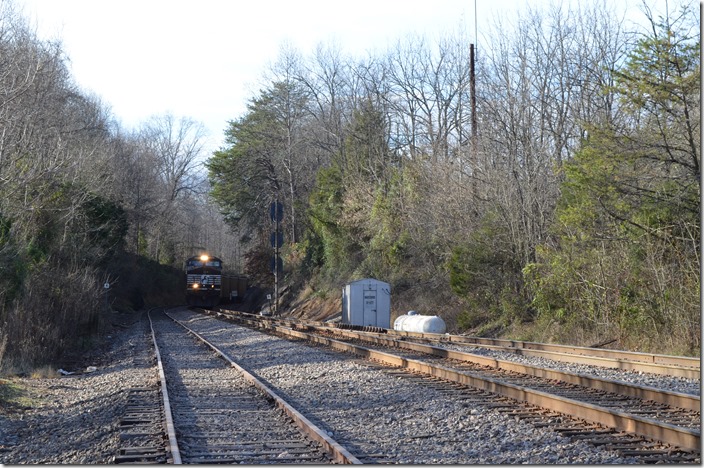 NS 778-17 approaches the switch to the “New Connection” that will lead it back to NS rails. NS 9733-7289-8695. Waycross TN.