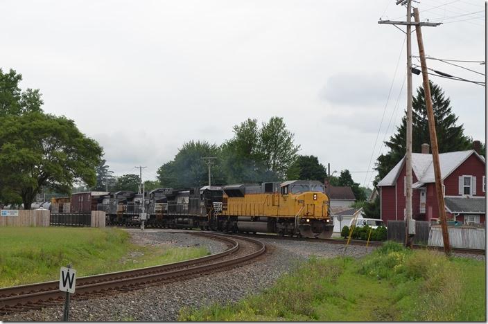 Ex-UP SD90MAC 7312 leads NS 8834-8430 on freight 174-17 (Macon to Elkhart) with 50/108. The southeast connection to the CFE is in the foreground. Bucyrus OH.