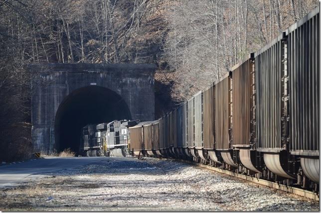 NS 8133-1059. N&W must have anticipated installing a ventilation fan at one time. The concrete-lined tunnel is 4,769 feet in length. Bandy VA is the nearest community on the west side. Bandy tunnel.