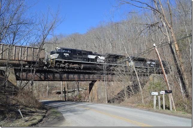 NS 1059-3613 J73 at Valls Creek WV. There is still a bit of “Norfolk & Western” on the girder.