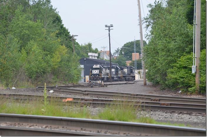 I learned that H98 would report at 11:00 a.m. They would use the two Geeps to switch the industrial park. During the night another job would run down to Lehighton and return. So it is not likely seeing this job struggling up the grade at Waverly in the daylight. Conrail used GP38s and SW1500s. NS 5620-4616-9370. View 7. Hazleton PA.