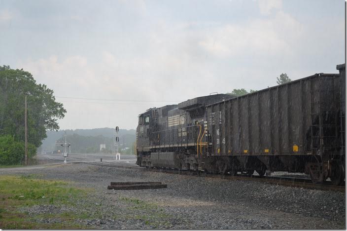 We are at Kenova waiting for the ferry run of Y-6 2156. Herb Parsons and I are caught in a brief thunder shower as 9119 goes back to Kenova yard with empties from KRT. We got drenched, but I love the shot. A CSX w/b was approaching in the distance. View 2.