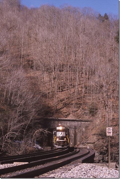 No. 746 exits Gordon Tunnel and crosses US 52 and the Tug Fork at Rogers.