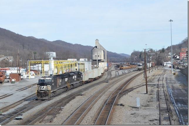 Bluefield ought to yield some action. Not like the old days, but there were two trains to go west. 29G-03 (Norfolk to Detroit) with 8367-2698 departs west. Today he has 16 intermodal for Columbus plus 7 empties. Behind those are 48 empty auto racks for Detroit. No. 195-04 (Linwood-Bellevue) has just pulled in for a crew change on Main 2. NS 8367-2698 leaving Bluefield VA.