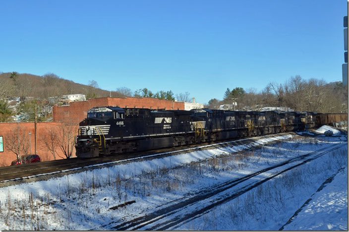 210 cars equal 29,735 tons and a length of 11,662 ft. NS has two of these trains. From Shire Oaks Yard they run through Pittsburgh, Cleveland, Bellevue, and south via Portsmouth OH to Roanoke. NS 1039-1012-4331-4304-4466 pushers. Bluefield VA.