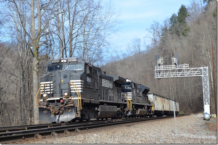 NS 8989-1168 on e/b J42-19 came off the Buchanan Branch with 106 loads of Tidewater coal from the Buchanan Mine. More cars were added, and it became 822-20. J42 is passing the Old Joe signals just east of Wharncliffe. Old Joe WV.