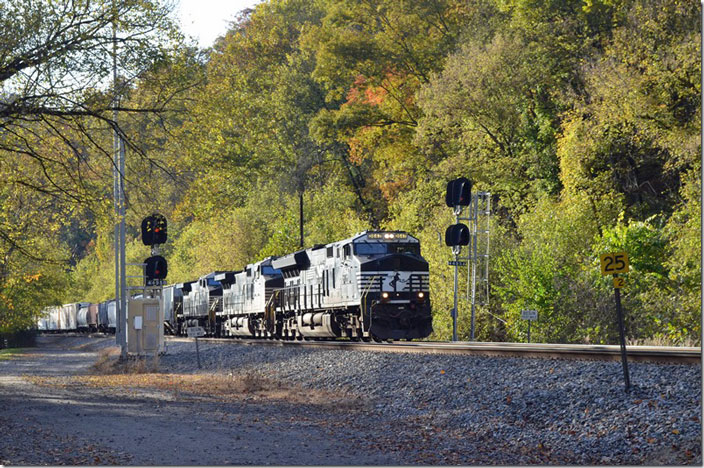 Shadows are growing long so I start inching west toward the Vulcan bridge to head back to Pikeville. NS 3647-9820-4280 rumble east with 18M-04 (Elkhart IN – Crewe VA). Today 18M has 75 loads and 24 empties. Cedar WV.