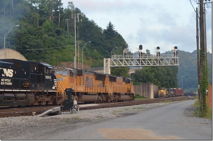 No. 195 (Linwood to Bellevue) pulls up by the flood wall for a crew change with UP 8764-NS 6715-1009. Tonight 195 has 28 loads and 83 empties. Williamson WV.