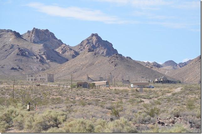 The most famous ghost town in Nevada. In this view are the remains of three commercial buildings, the bottle house, and the depot. There are several websites that devoted to Rhyolite, some of which have historical photos. Rhyolite NV.