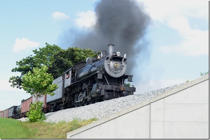 Reminiscent of a N&W mixed train on the Abingdon Branch, former N&W 4-8-0 475 crosses a farm lane overpass at Groffs PA, on the Strasburg Railroad. N&W 475. Groffs PA