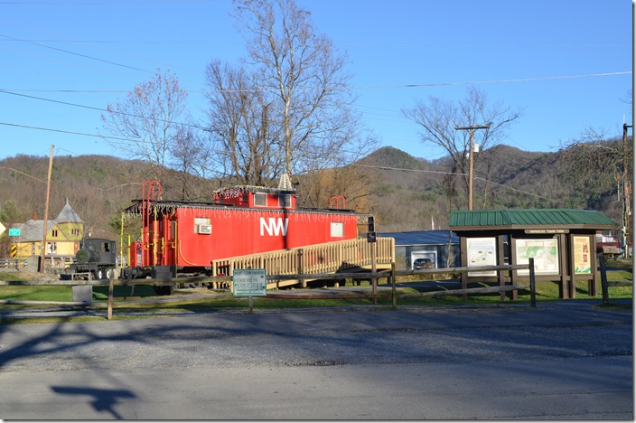 This former Wheeling & Lake Erie caboose is sitting beside the old roadbed. To the right is the Damascus city park. NW caboose 557758. Damascus VA.