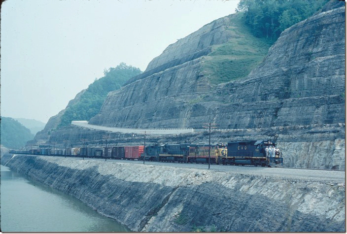 C&O Manifest freight No. 97 makes the first run over the new track through the Cut-Thru. 07-07-1978. Pikeville KY.