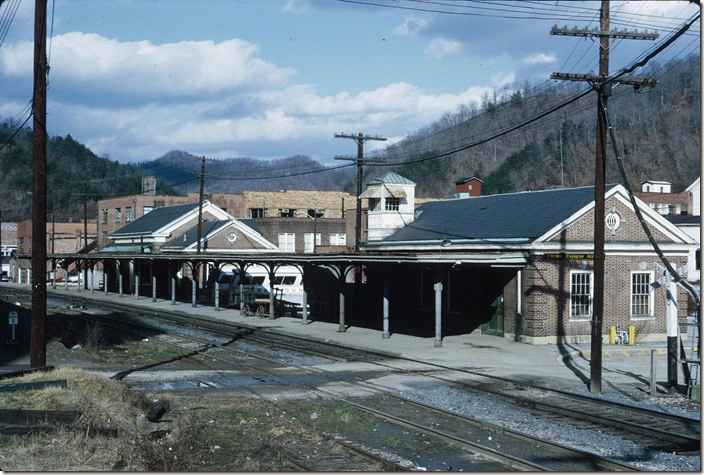 C&O Pikeville passenger depot from the east end. REA or express office in foreground. Cupola on roof used to control crossing gates when switching. Grayhound used depot as a bus terminal, but C&O freight agent also used part of depot building. 03-05-1972. Pikeville KY.