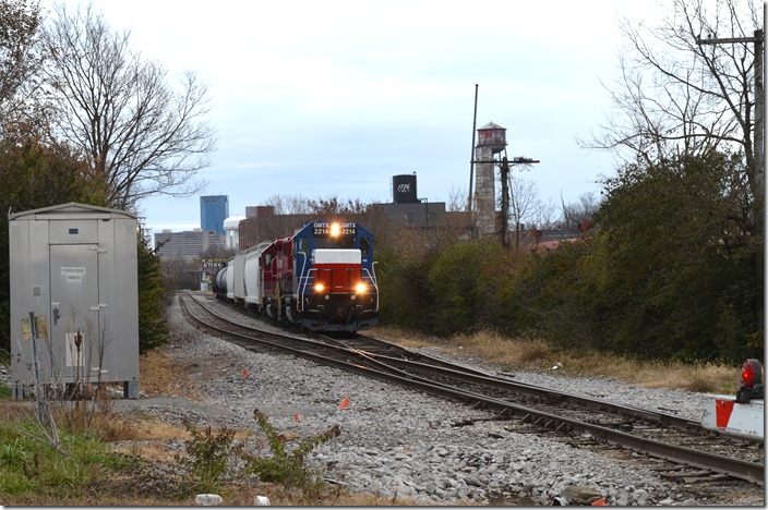 While detouring around the west side of Lexington on 11-21-2019, I spotted this westbound just west of Lexington yard. GMTX 2214-RJC 3850. Lexington KY.