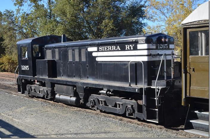 This engine is an ex-U. S. Army Baldwin model RS-4-TC built in 1953. It worked until 2005 at a munitions plant at Riverbank CA before the plant closed. This locomotive was re-built with a Caterpillar engine in 1994. SRy 1265. Jamestown CA.