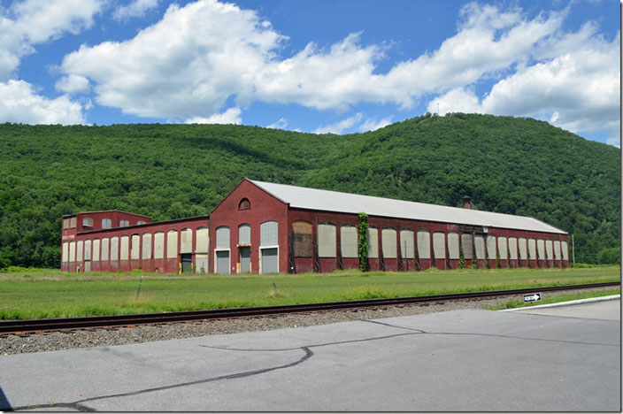 Renovo was the location of one of the large steam locomotive repair shops on the PRR. The others being Altoona and Columbus which were larger. Renovo started as the central shop of the Philadelphia & Erie in 1863. The shop and yard were enlarged several times, but the repair facility started its decline with the coming of diesel locomotives post WWII. PRR closed the shop in January 1968. Renovo PA ex-PRR shop.