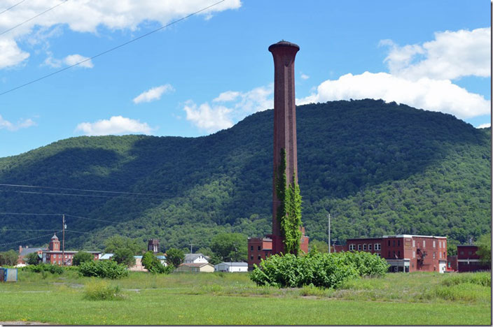 Looks line a smoke stack. The passenger car shop, paint shop and transfer table and storage buildings, etc. would have covered this area. Renovo PA ex-PRR shop view 5.