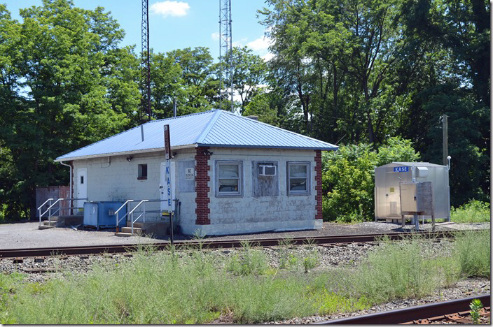 In the late 1950s PRR single-tracked the Buffalo Line and this concrete block structure replaced the wooden tower. New “Kase” had a CTC machine that controlled a segment of the main line (Harrisburg Div. portion) as well as the Wilkes-Barre and Shamokin Branches. It is no longer manned by an operator. NS CP Kase. Sunbury PA.