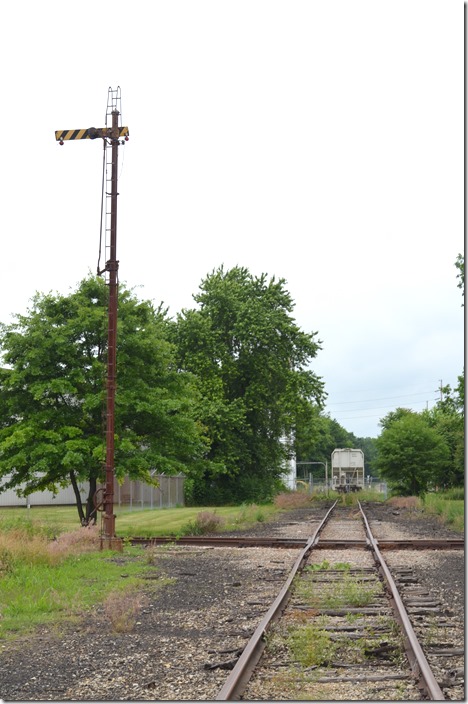 Looking north on the old NYC Alliance Br. W&LE in foreground. WLE crossing signal. Minerva OH.