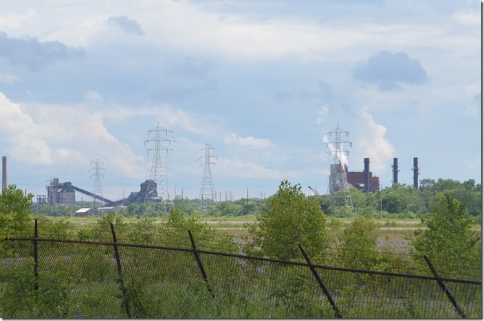 From Pine St. looking across the vacant property at the Cleveland-Cliffs (formerly RG Steel, Severstal, LTV, and Republic Steel before that) coke plant. Cleveland-Cliffs coke plant. Warren OH.