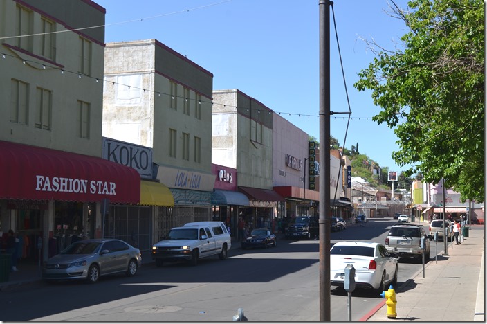 Looking south on Morely St. with the border fence in the background. Sue visited some of the shops. Nogales AZ.