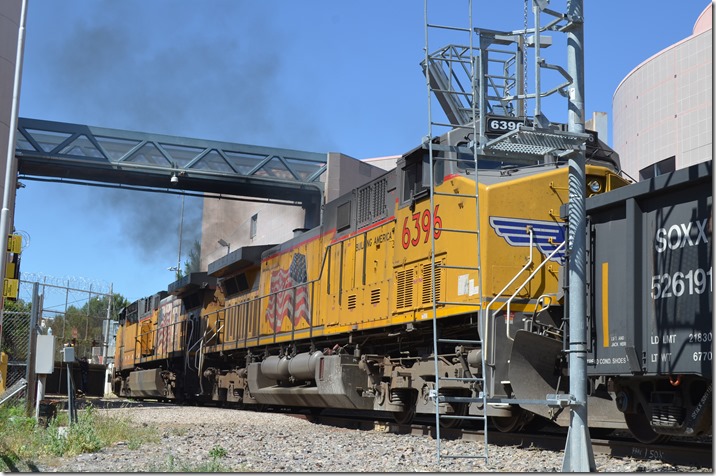 The gate has been opened, and this train of cross-border commerce is heading into Mexico. That X-Ray equipment is scanning the train. UP 5828-6396. View 3. Nogales AZ.