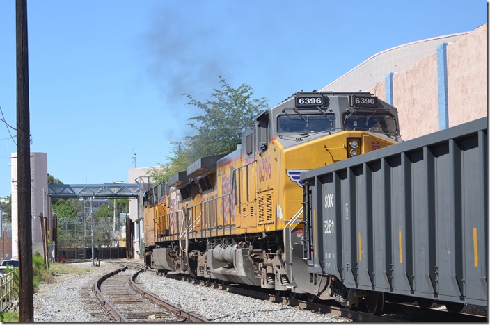 UP 5828-6396. UP 6396 is former SP. Officers are standing by the gate. Nogales AZ.