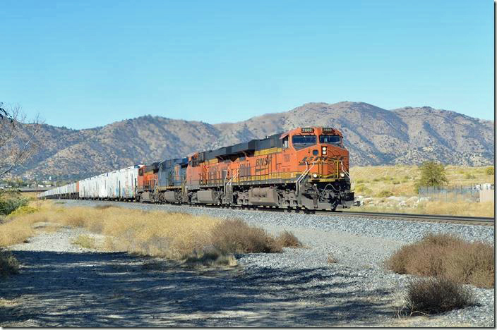 We beat 7800 up to Tehachapi which is about 8 miles. The grade lessens, but the summit is still another 2 miles east. BNSF 7800-6746-596-3841. Tehachapi.