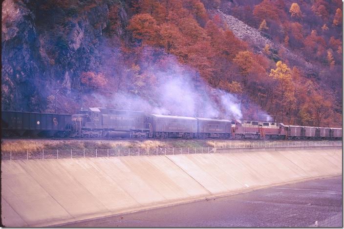 7495-403-404-3580-3576 are mid-train helpers. I regret we didn’t follow this train further, but we had a long drive back to Pikeville. In those days we had to go to work the next day! WM Ridgeley WV. 