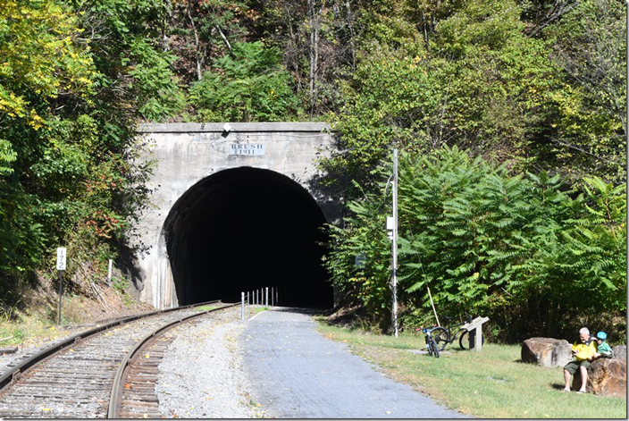 The former double track roadbed is now shared by a walking and biking path. Even on this beautiful fall morning I was surprised at how many people were using it. This is the east portal. WMSR. Brush Tunnel. East portal.