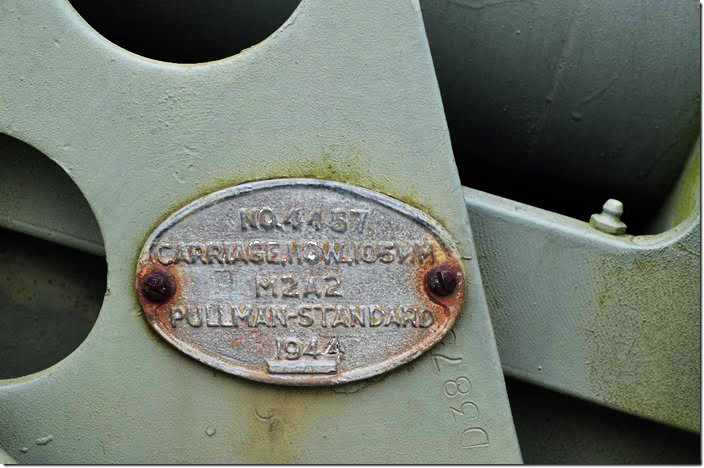 The carriage was manufactured by railroad car builder Pullman-Standard in 1944. 105 mm howitzer manufacturer plate. West Lafayette OH.